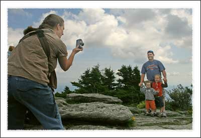 Posing for a photo on the top of Grandfather Mountain in Linville NC